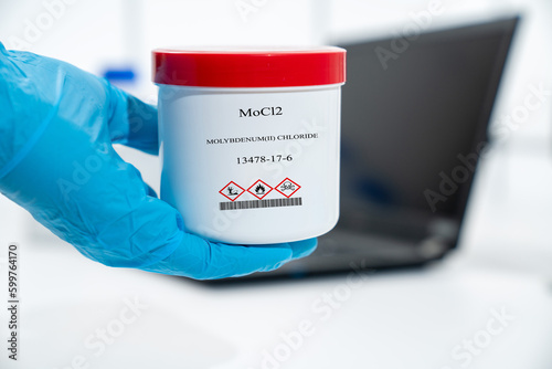 Fototapeta Naklejka Na Ścianę i Meble -  MoCl2 molybdenum(II) chloride CAS 13478-17-6 chemical substance in white plastic laboratory packaging