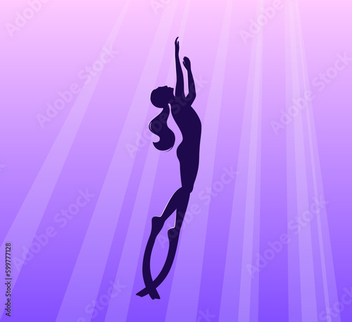 The girl is a freediver at depth. Female silhouette.
