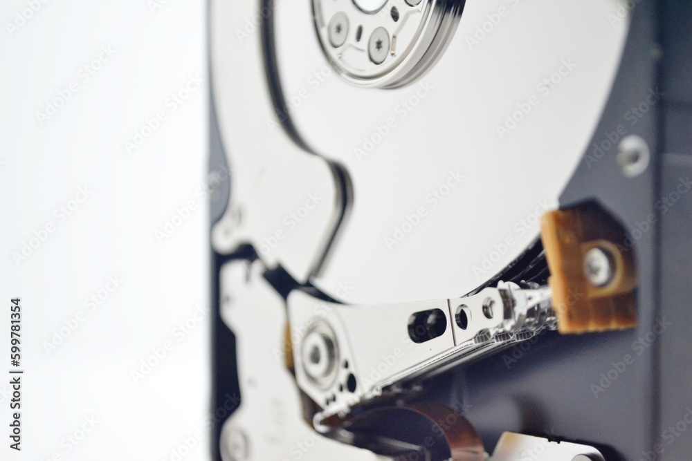 A computer hard disk made of aluminum, glass or ceramic with a layer of