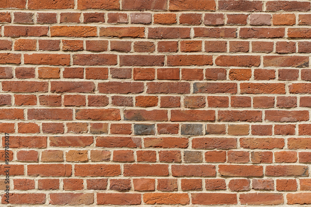 Brick wall. Brickwork from an old brick in a rustic style. Structure and pattern of the destroyed stone wall. Copy space Brick wall. Brickwork from an old brick in a rustic style. Structure and pattern of the destroyed stone wall. Copy space