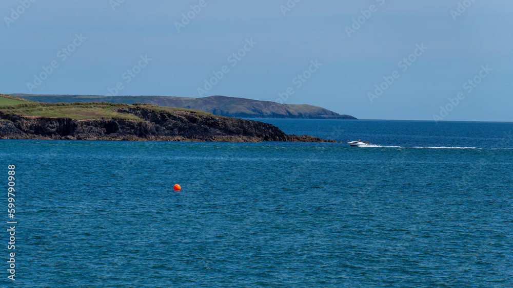 seascape. Blue clear sky over the blue waters of the Atlantic Ocean. The coast of Ireland.