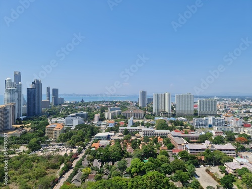 Top view of Pattaya city with blue sky and blue sea. The landscape background for wallpaper. The ideal of feeling happy ,calm,relax,vacation © Kornkamon