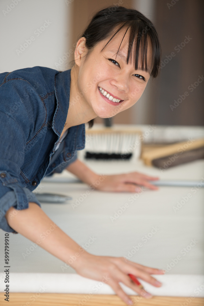 happy woman doing refurbishment at home happy woman doing refurbishment at home