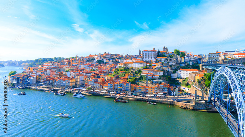 Aerial panoramic view of Porto cityscape, iron bridge and douro river