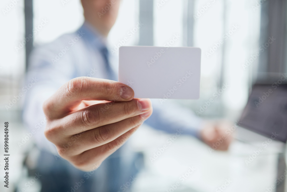 Show a blank piece of paper. Paper visit card.