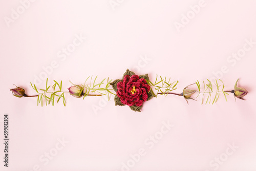 Festive flower composition on pink background. Overhead view