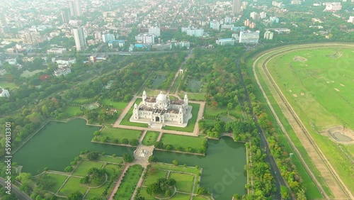 Kolkata: Aerial view of city in India, famous Victoria Memorial, large marble building on Maidan - landscape panorama of South Asia from above photo