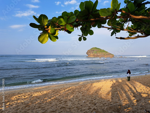 Watu Karung Beach, Pacitan, East Java, Indonesia. A beach with friendly waves for surfers.                       photo