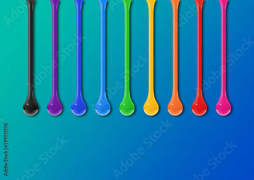 Colorful ink drops on blue background. Horizontal wallpaper