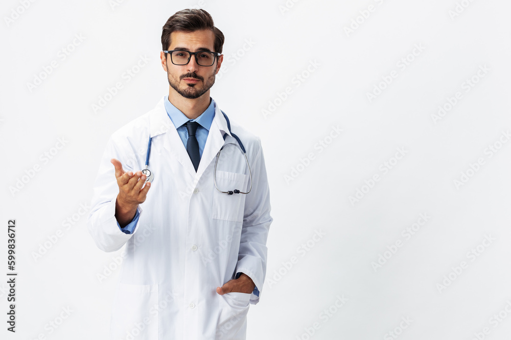 Man portrait doctor in white coat and eyeglasses and stethoscope looking into camera shows hands on background on white isolated background, space for copy, space for text, health Man portrait doctor in white coat and eyeglasses and stethoscope looking into camera shows hands on background on white isolated background, space for copy, space for text, health