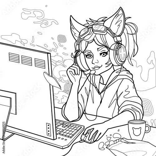 Girl gamer or streamer with cat ears headset sits at a computer.
