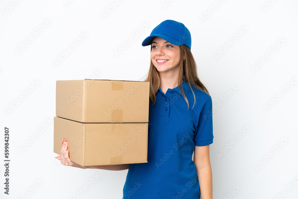 Delivery Lithuanian woman isolated on white background looking to the side and smiling Delivery Lithuanian woman isolated on white background looking to the side and smiling