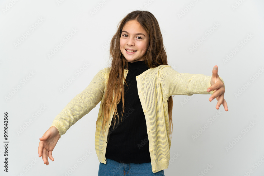Little girl over isolated white background presenting and inviting to come with hand Little girl over isolated white background presenting and inviting to come with hand