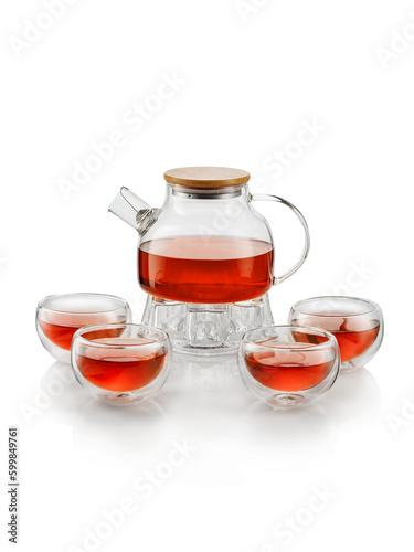 Glass Teapot and cups with red tea on white background