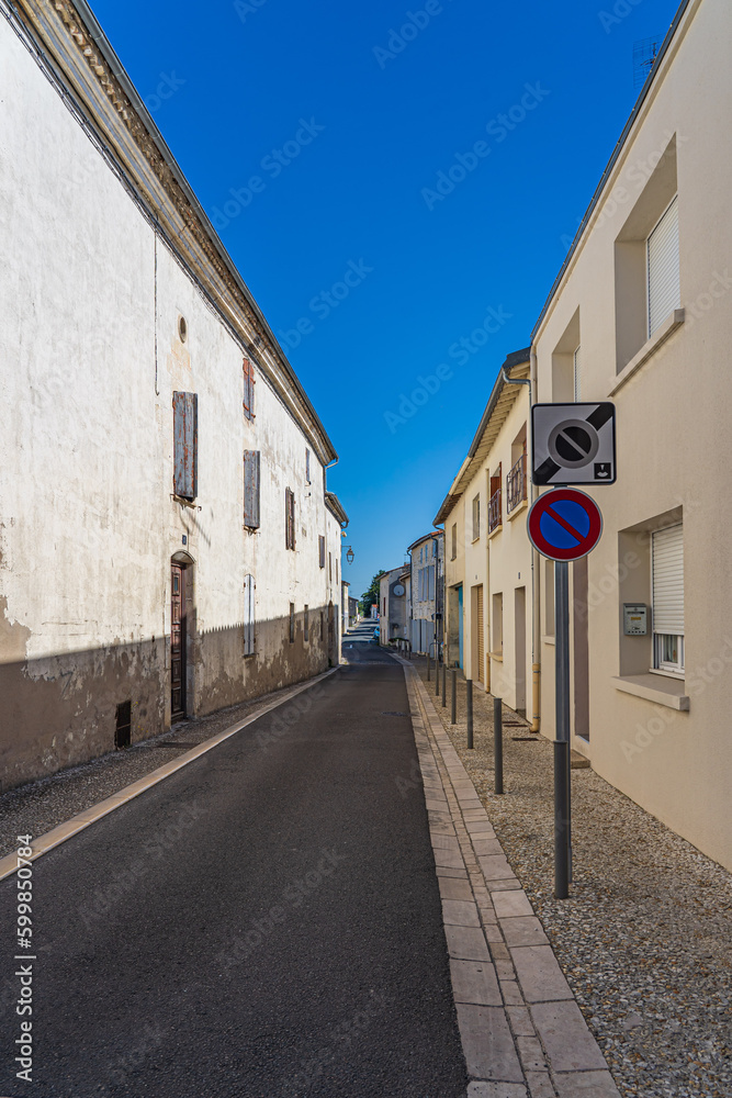 No parking - road sign on a narrow street in a small French town