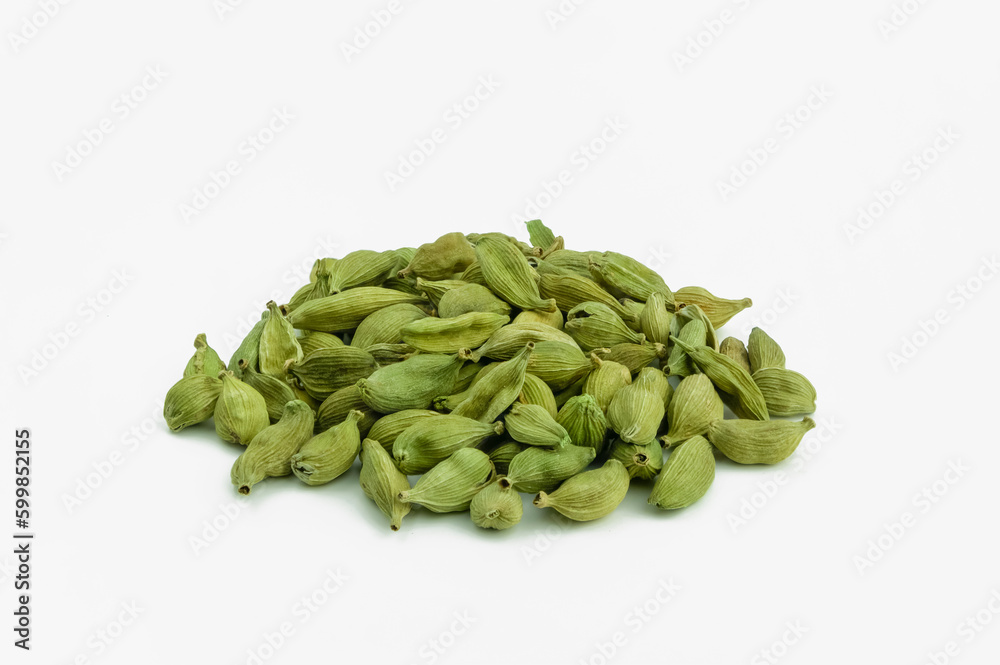 dried cardamom seeds isolated on white background dried cardamom seeds isolated on white background