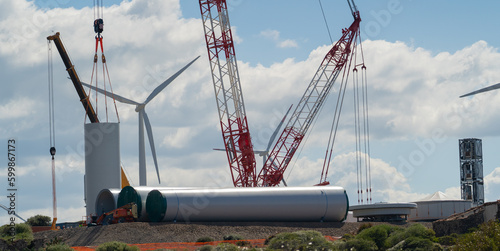 Bild auf Leinwand wind shovel - a big crane works on the construction of a wind shovel