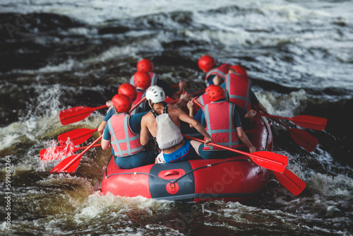 Foto Red raft boat during whitewater rafting extreme water sports on water rapids, ka