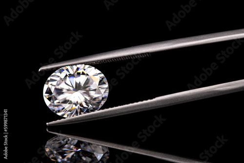 Diamond in Jewelry Tweezers © Levon