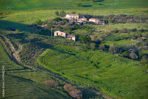 farmhouses among the spring pastures and hills of the Nebrodi mountains in Sicily