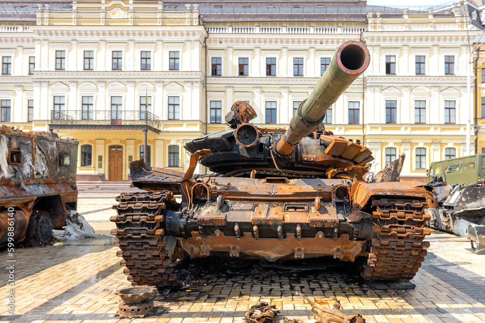 Destroyed rusty Russian tank on display in the city square for viewing. Kyiv, Ukraine.