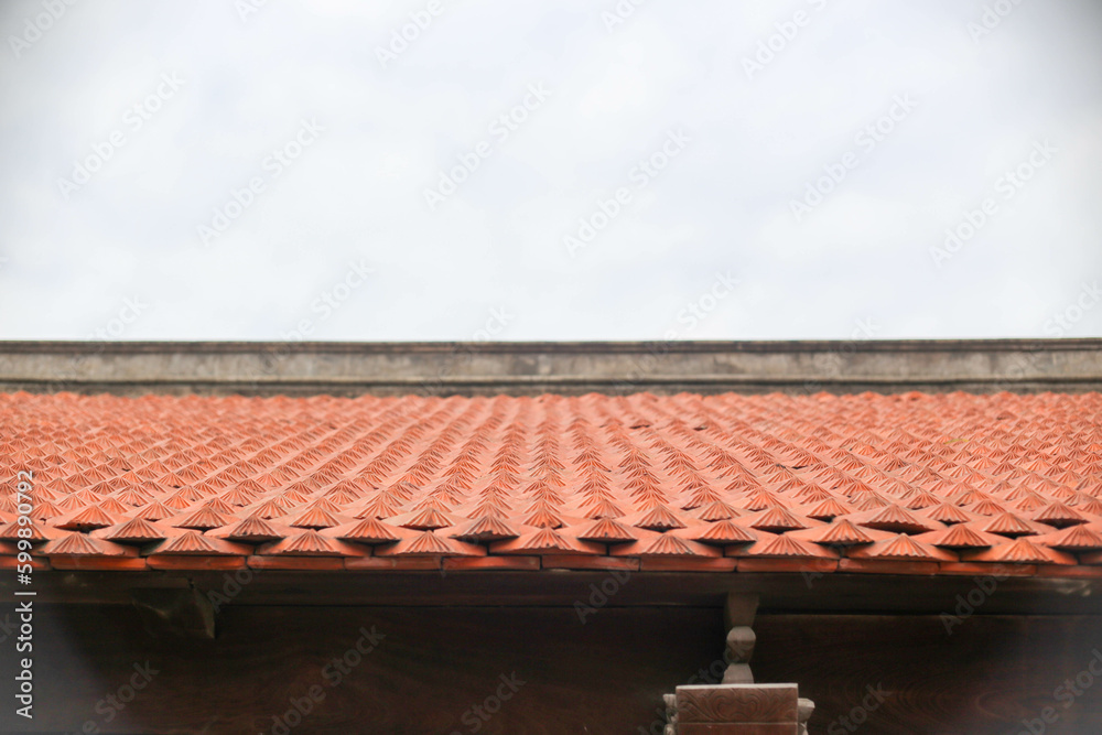 Fototapeta premium Closeup of tile roof of an ancient temple in Hai Duong