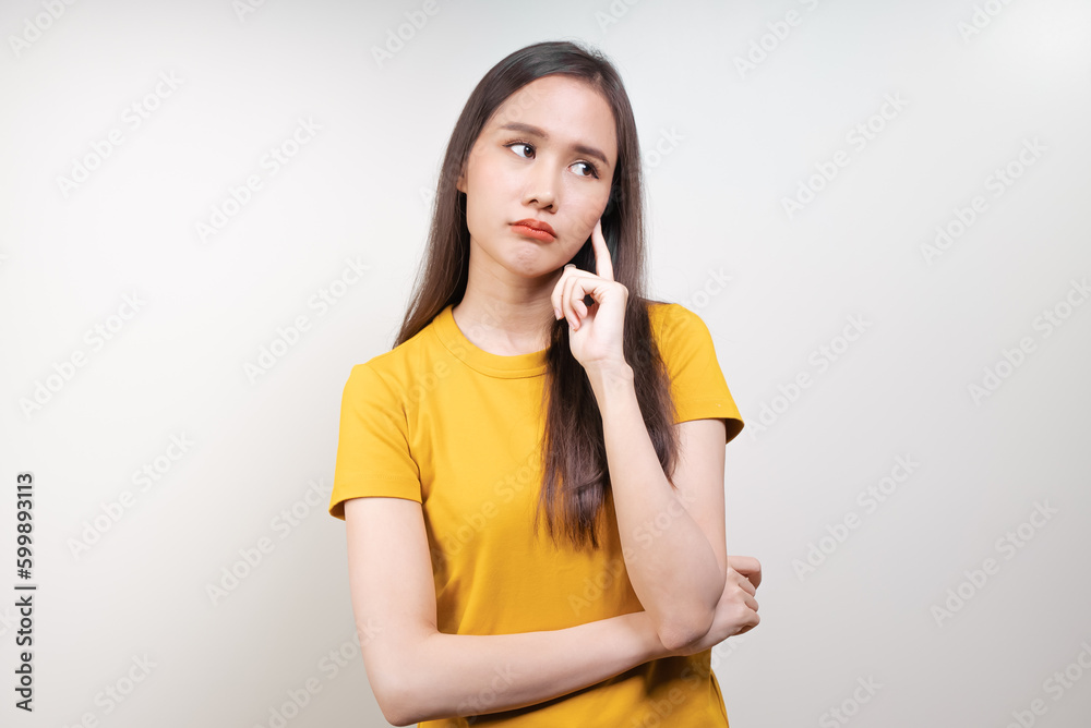 asian woman in color casual dress thinking and imagination isolated on pink background asian woman in color casual dress thinking and imagination isolated on pink background