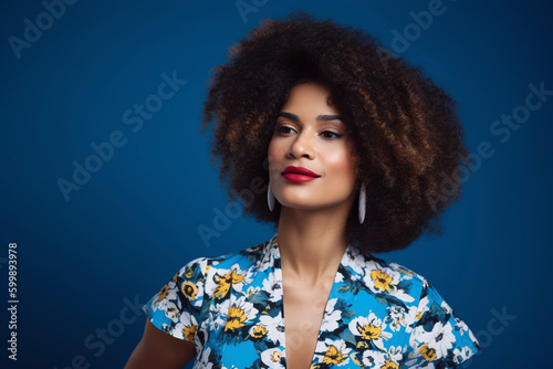 A portrait of a young african american woman with an afro hair style against a blue background. Generative AI © All Creative Lines
