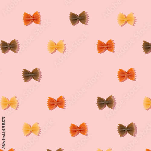 Pattern made of pasta on a pink background. Flat lay © Dragan