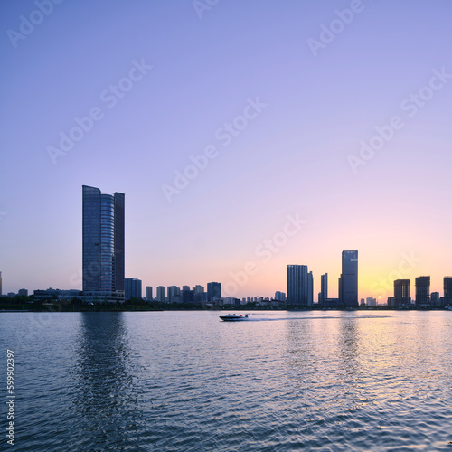 city skyline at sunset © lujing