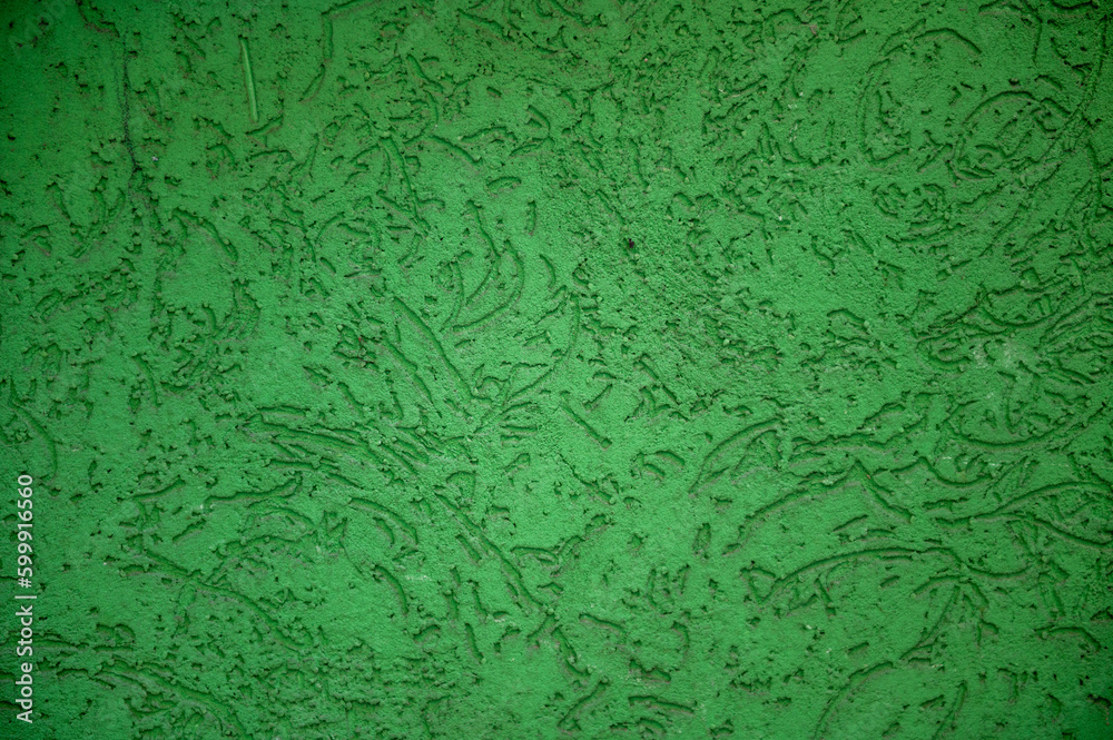 Green wall close up. Abstract background of painted green wall. Green wall close up. Abstract background of painted green wall.