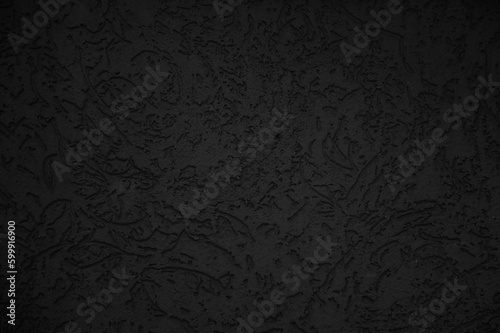 Black wall close up. Abstract background of painted black wall.