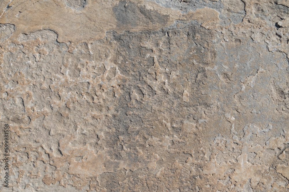 natural rough weathered beige gray rock texture abstract background