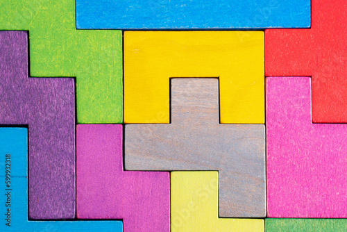 Abstract Background. Background with different colorful shapes wooden blocks.