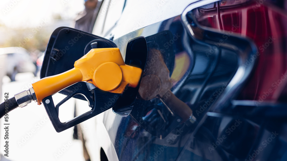 Refill and filling Oil Gas Fuel at station. Gas station refueling. To