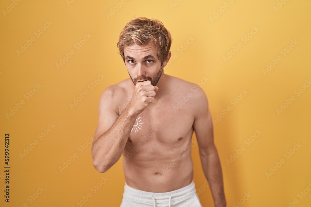 Caucasian man standing shirtless wearing sun screen feeling unwell and coughing as symptom for cold or bronchitis. health care concept.