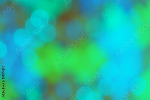 Blue green Bokeh abstract background. Colourful blurred bokeh backdrop.