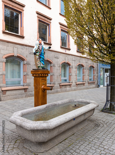 Villingen-Schwenningen, Germany - April 30, 2023: The statue of Narro that has been the characteristic figure of the historical Villingen carnival since the end of the Middle Ages photo