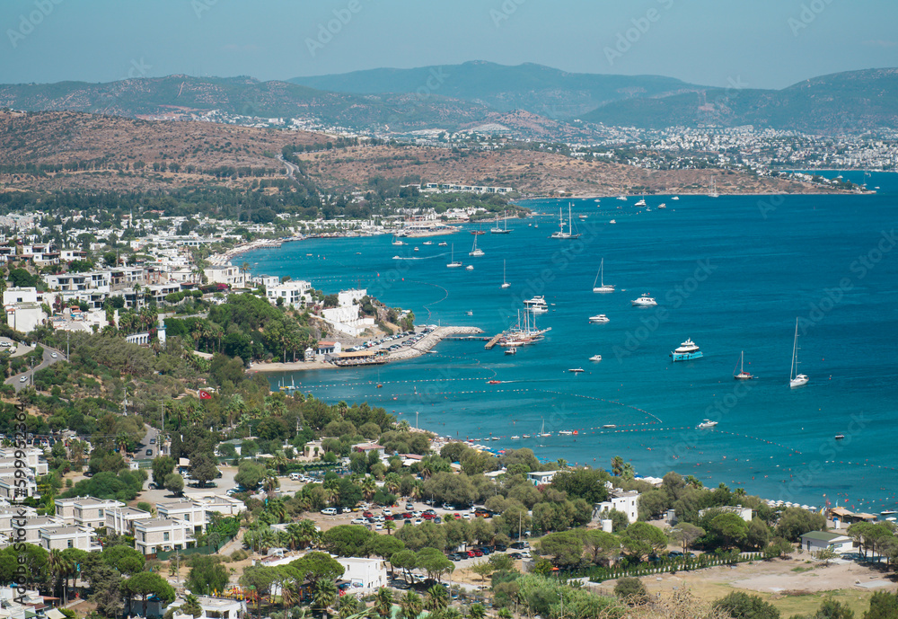 Bodrum Town panoramic view at sunny day.  landscape with marina, sailing boats, yachts in popular and touristic Bodrum city, Turkey