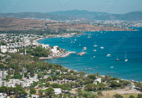 Bodrum Town panoramic view at sunny day.  landscape with marina, sailing boats, yachts in popular and touristic Bodrum city, Turkey © Anna