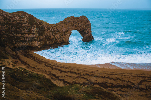 Rock arch of Durdle Door in Lulworth, UK photo