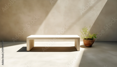 a white bench on the floor and a concrete wall behind it, next to a pot with a plant