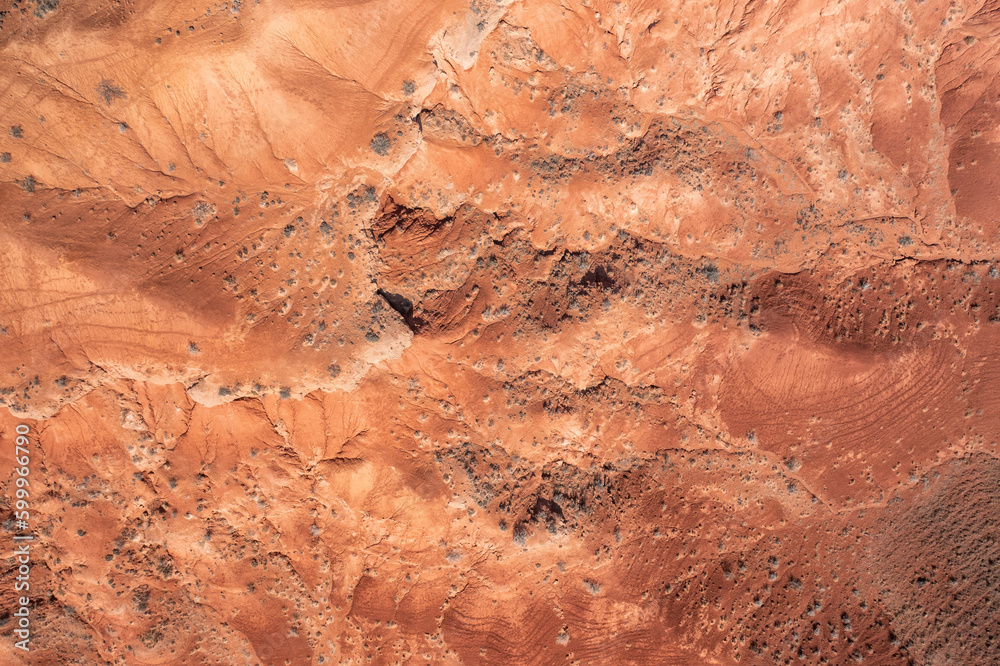 Top view of Mars-like terrain in a stunning red canyon.