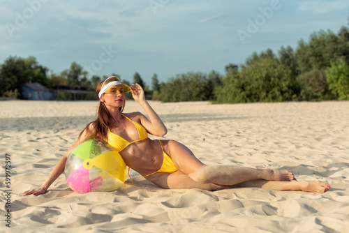 Young woman relaxing on the beach