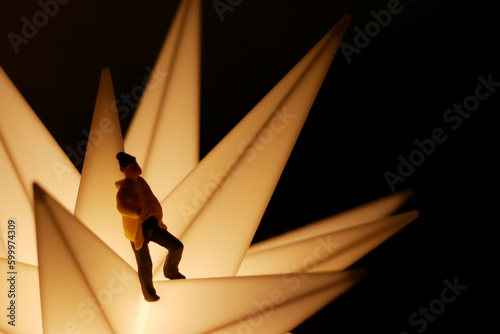 little man standing and relaxing on a moravian star photo