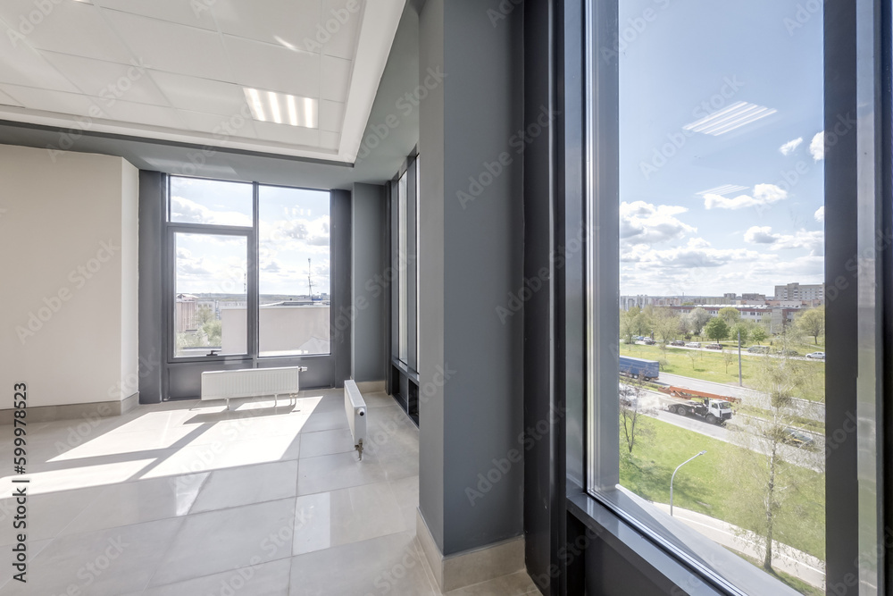 empty modern hall room with columns, doors and panoramic windows. empty modern hall room with columns, doors and panoramic windows.