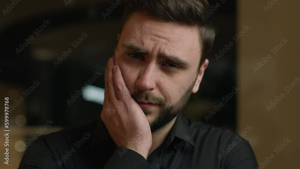 Unhealthy sick Caucasian guy businessman man has toothache oral illness problem with hygiene teeth caries feel dental ache discomfort suffer aching toothy pain sensitive tooth touching inflamed cheek Unhealthy sick Caucasian guy businessman man has toothache oral illness problem with hygiene teeth caries feel dental ache discomfort suffer aching toothy pain sensitive tooth touching inflamed cheek