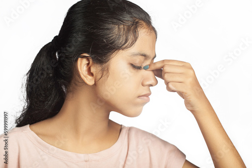 women having nose injury pain or paranasal sinus due to cold and flu photo