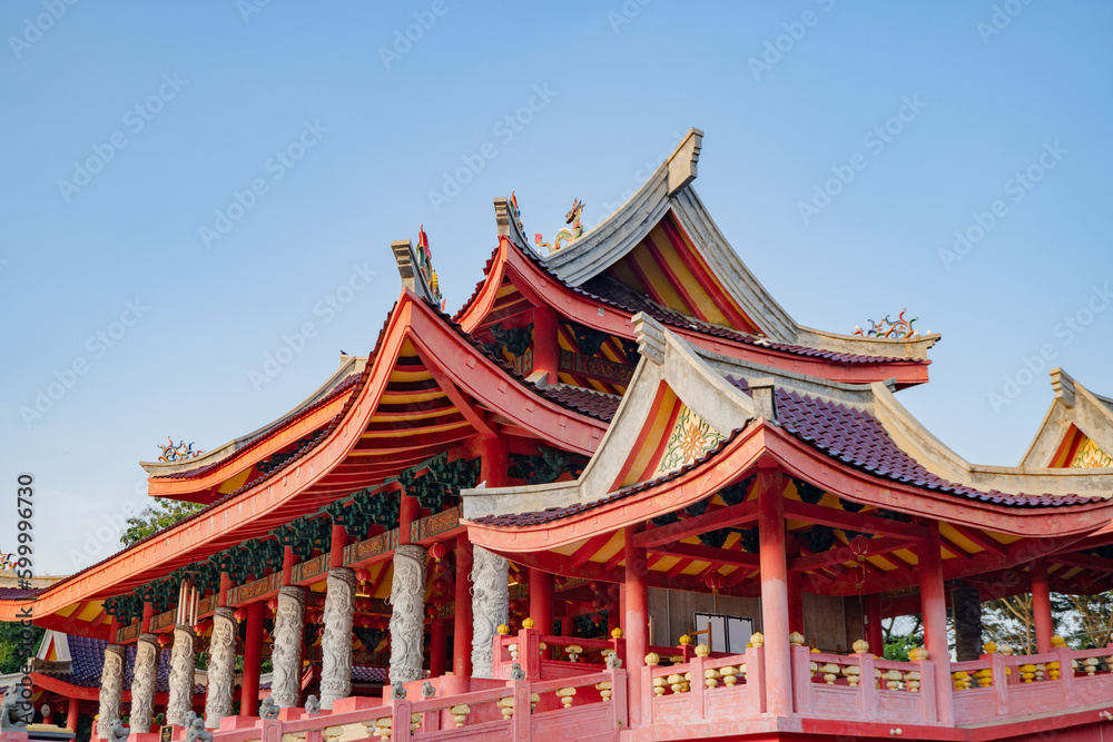 Chinese temple with guardian statue when Chinese new year celebration. The photo is suitable to use for Chinese new year, lunar new year background and content media.