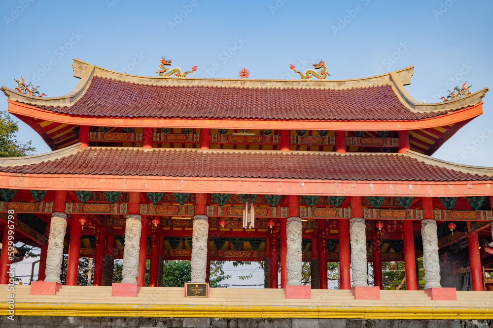 Chinese temple with guardian statue when Chinese new year celebration. The photo is suitable to use for Chinese new year, lunar new year background and content media.